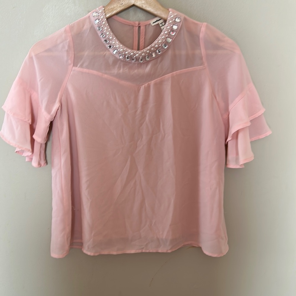 Light pink ruffle sleeve blouse